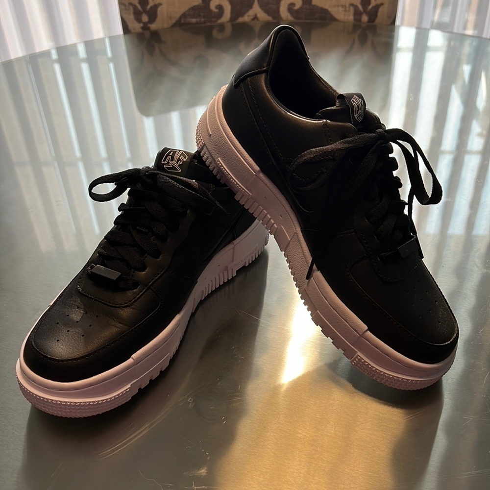 Women’s black Air Force 1 pixel. Women’s size 7.5. Only worn two times. No box.